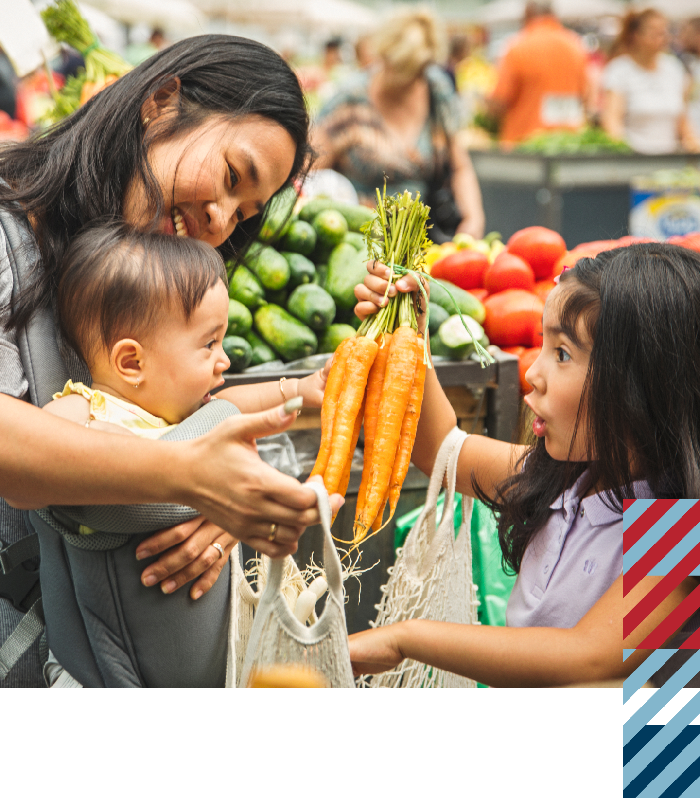 Image of a family looking at a bunch of carrots
